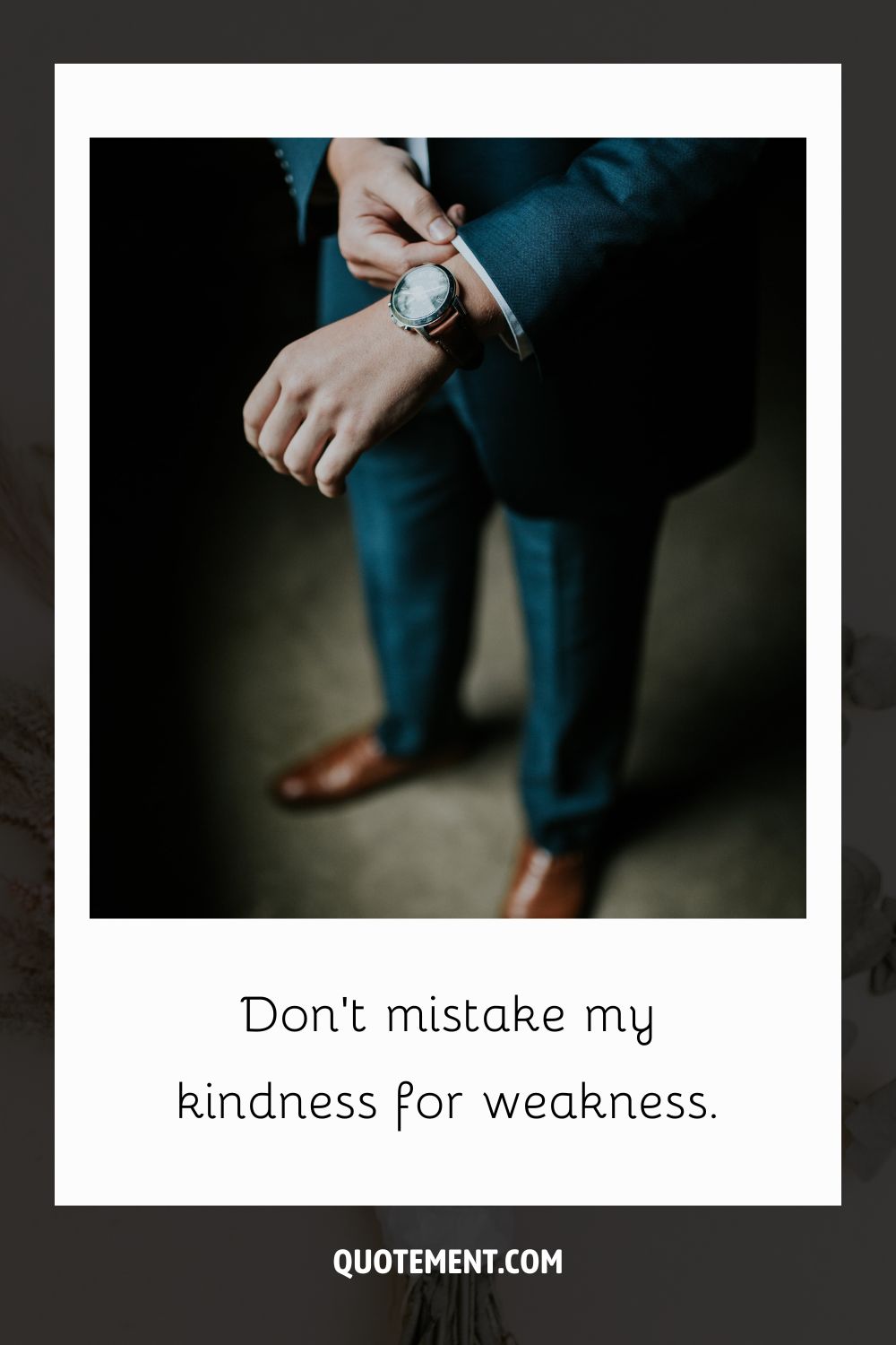 Image of a man in a suit wearing a watch representing a dope caption for guys.
