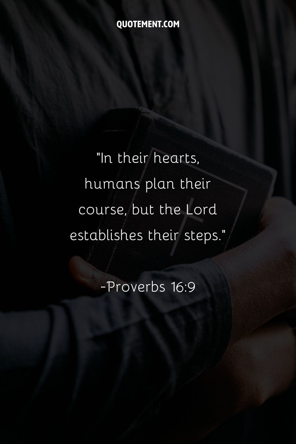 Image of a person cradling the Bible representing verse about God's plan.
