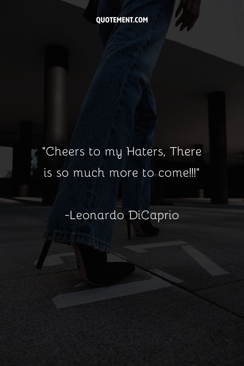 Image of a woman walking in jeans and heels representing quote on haters.
