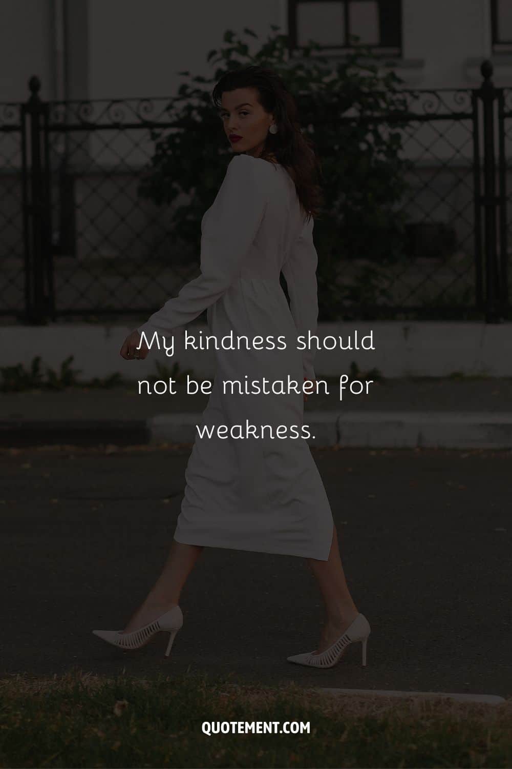 Image of an elegant lady in white representing a caption for bad bitches.