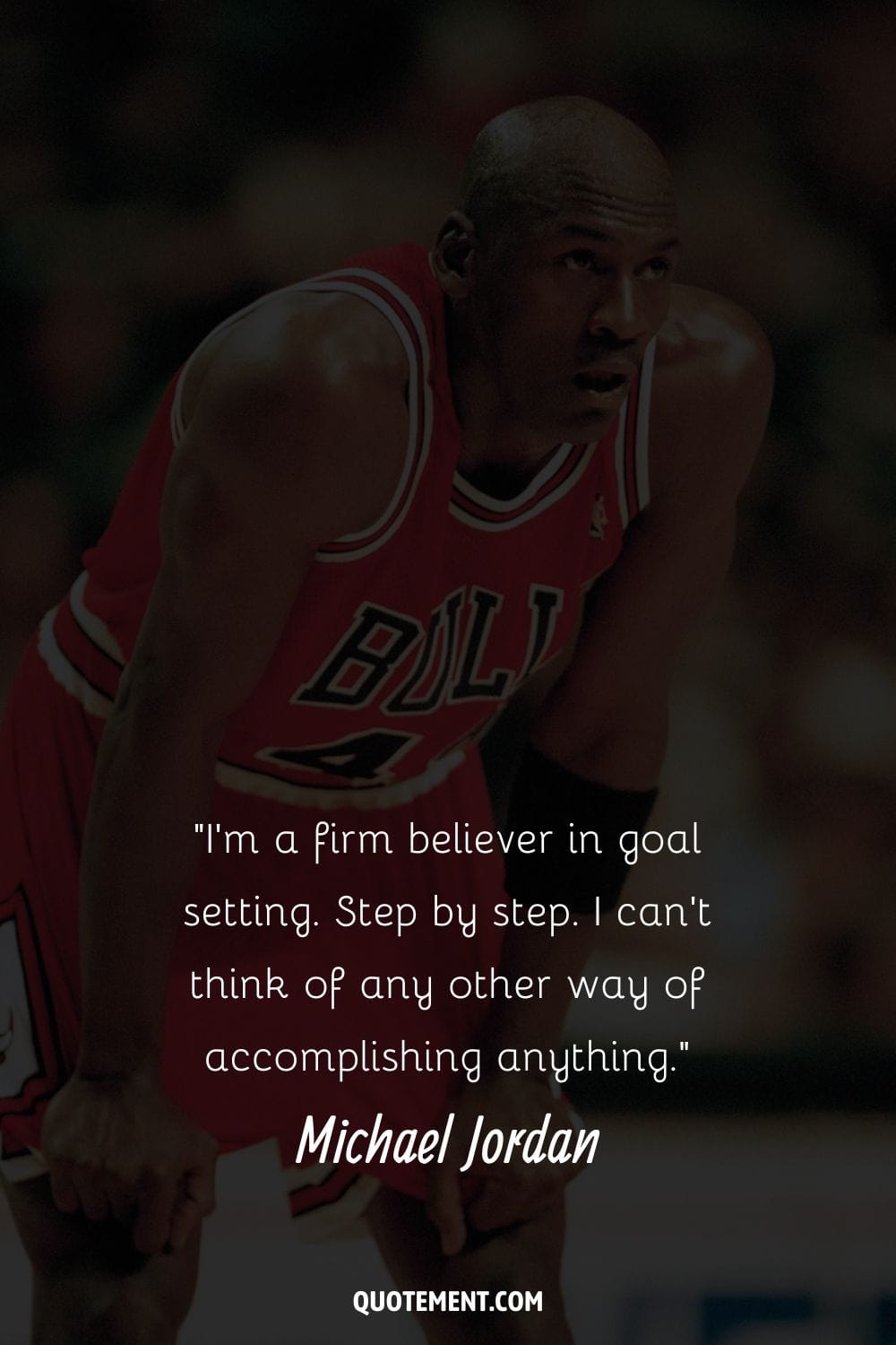 Michael Jordan on court leaning forward representing an inspiring MJ quote