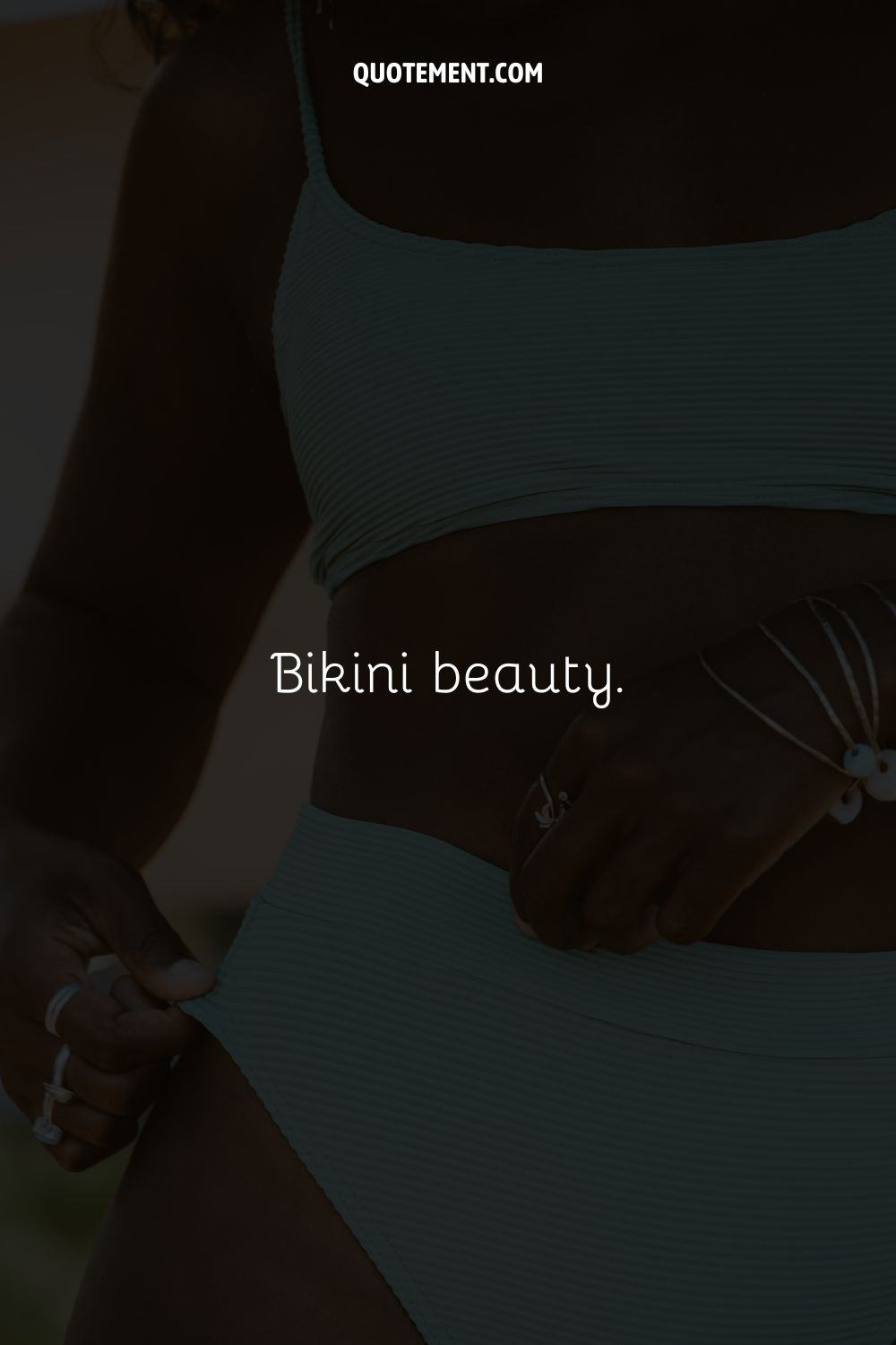 Photo of a white bikini representing a short bikini caption.
