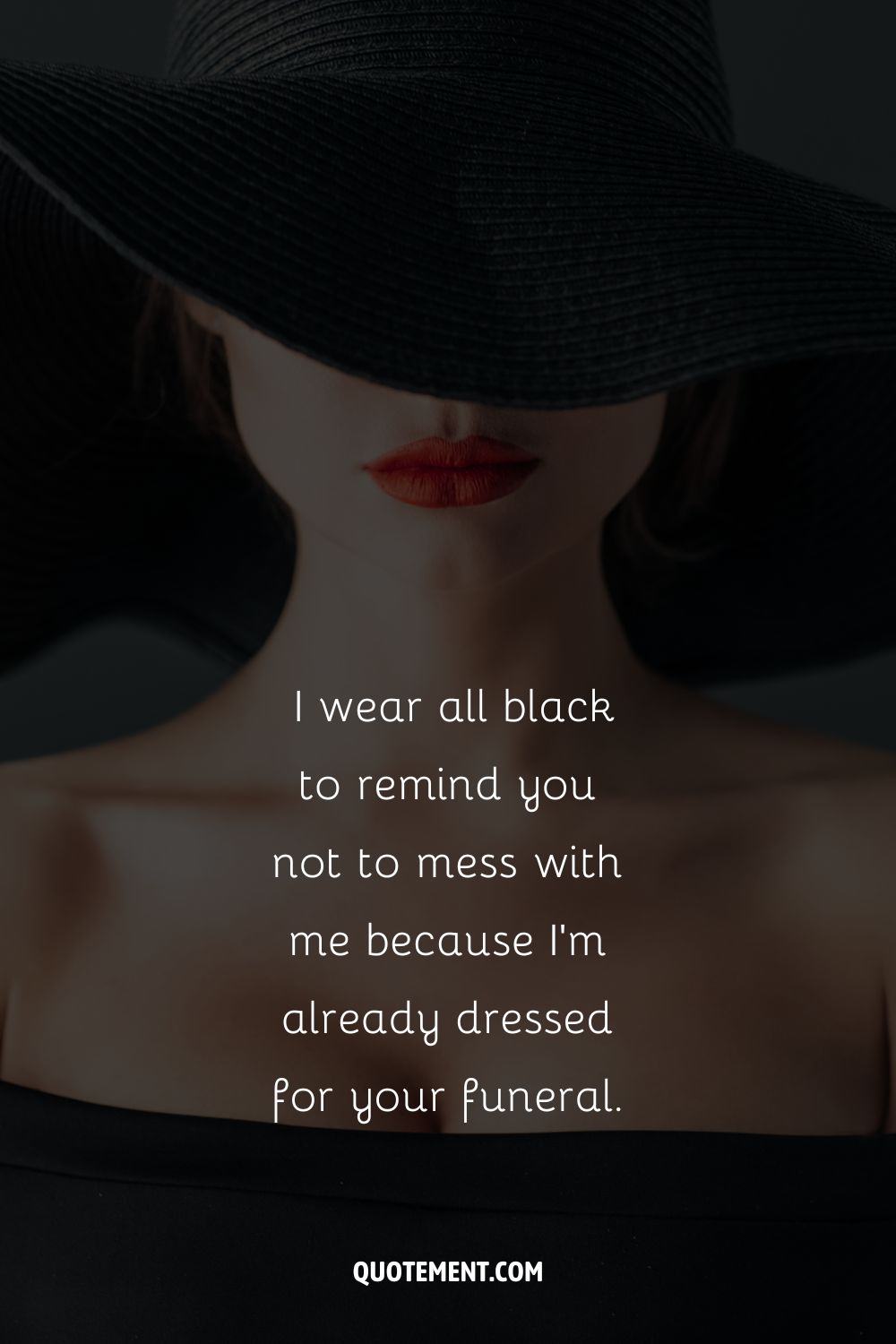 Sensual red lips peeking from black hat representing wearing black caption.
