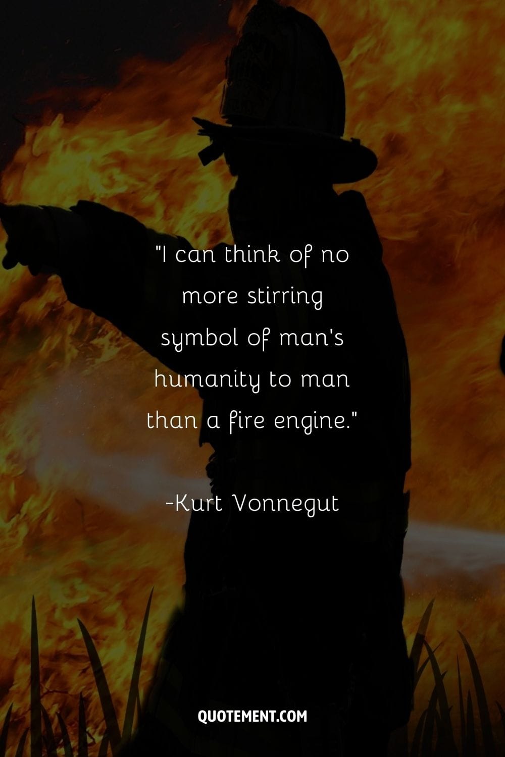 With flames all around, a firefighter stands as hope.
