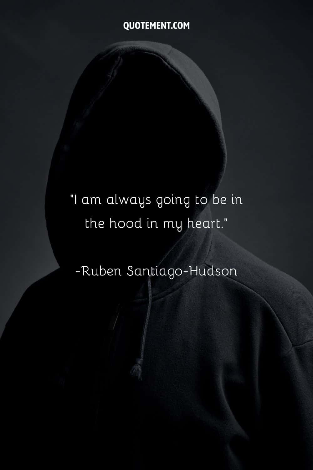 a man in a hoodie, his face covered in black