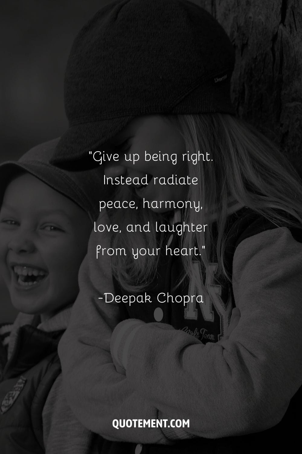 boy and girl wearing caps, enjoying a good laugh