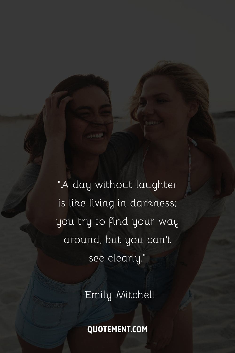 two smiling girls sharing a hug at the beach representing the best quote about laughter