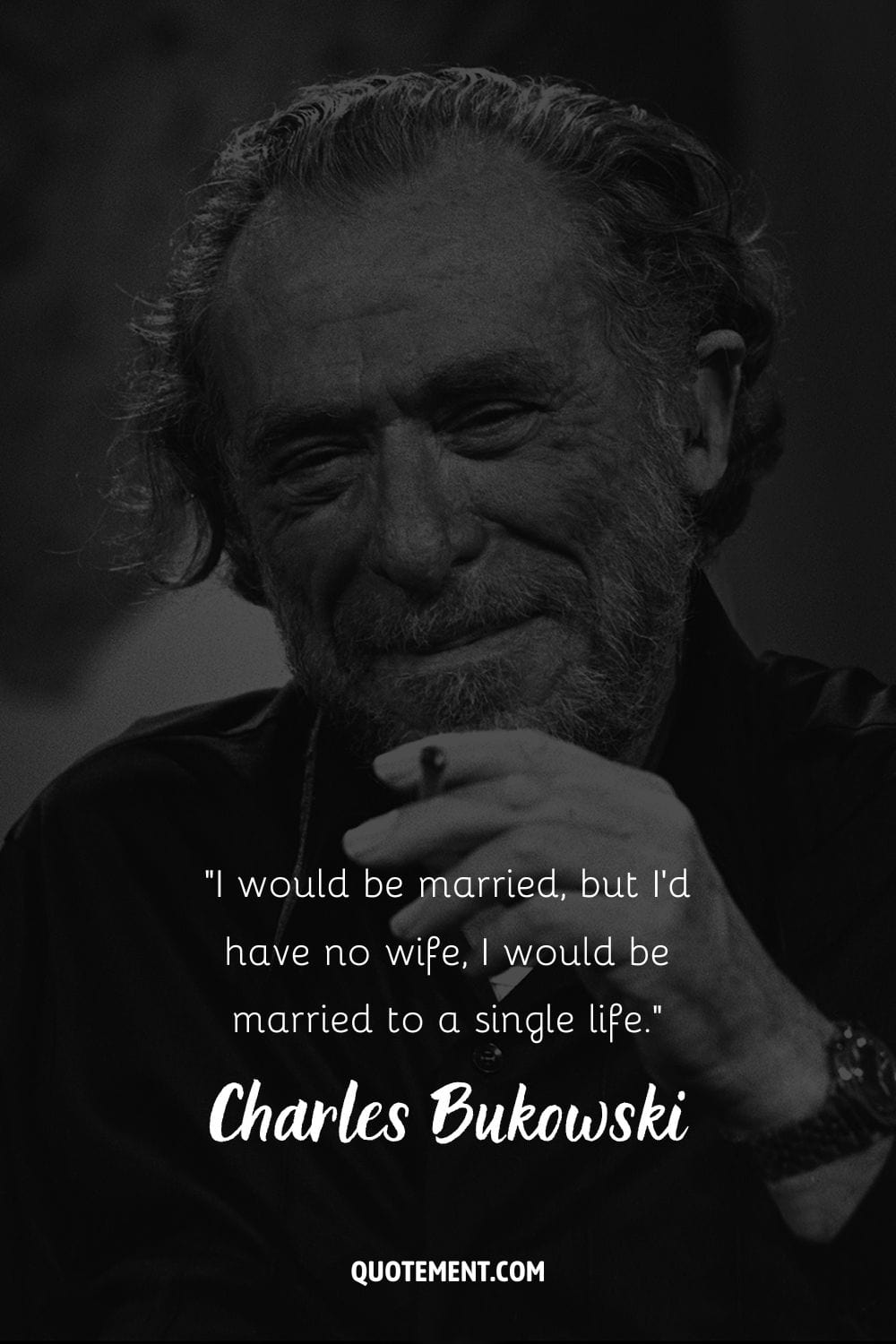 Bukowski holding a cigarette and smiling