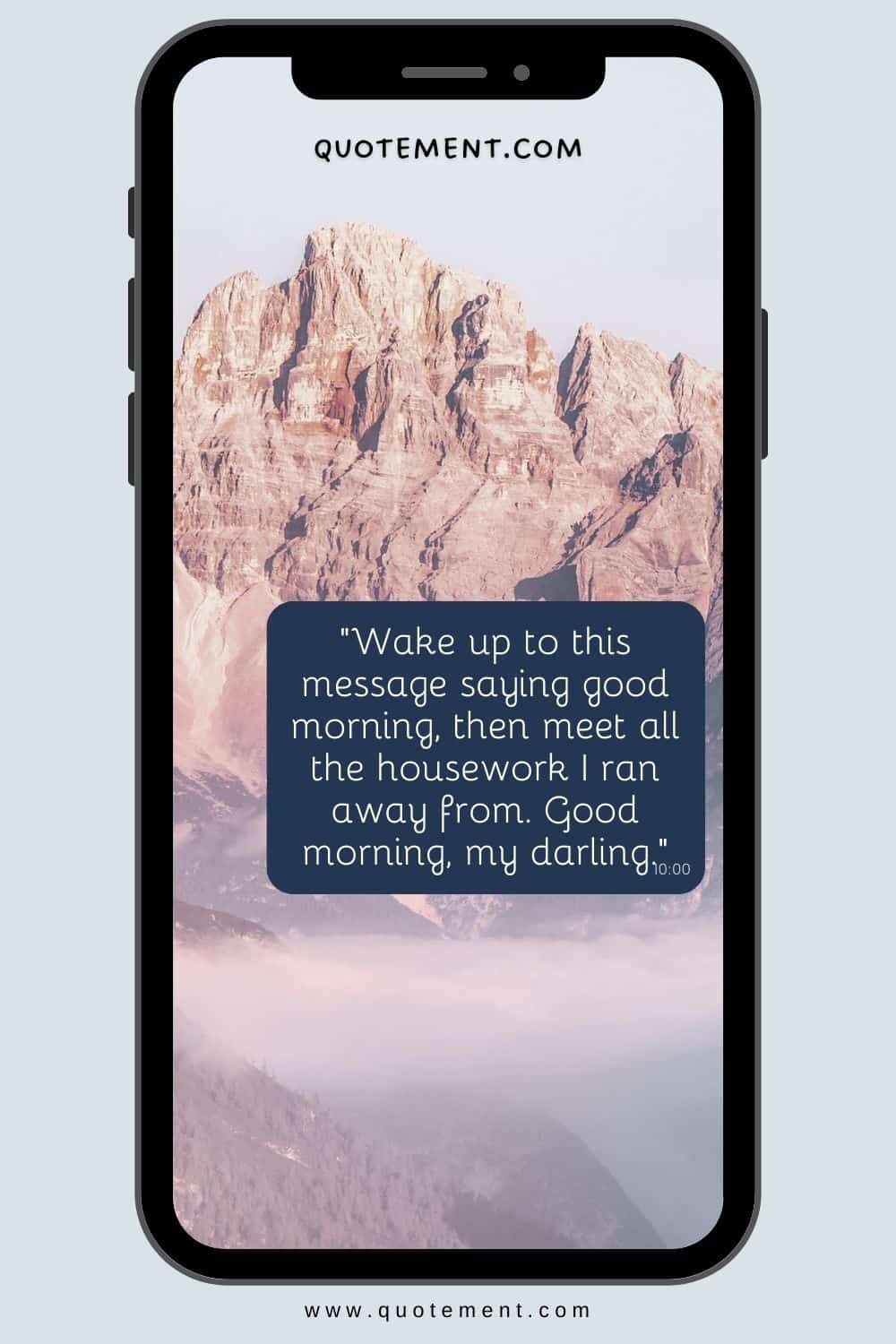 message displayed on a phone screen with a mountain backdrop