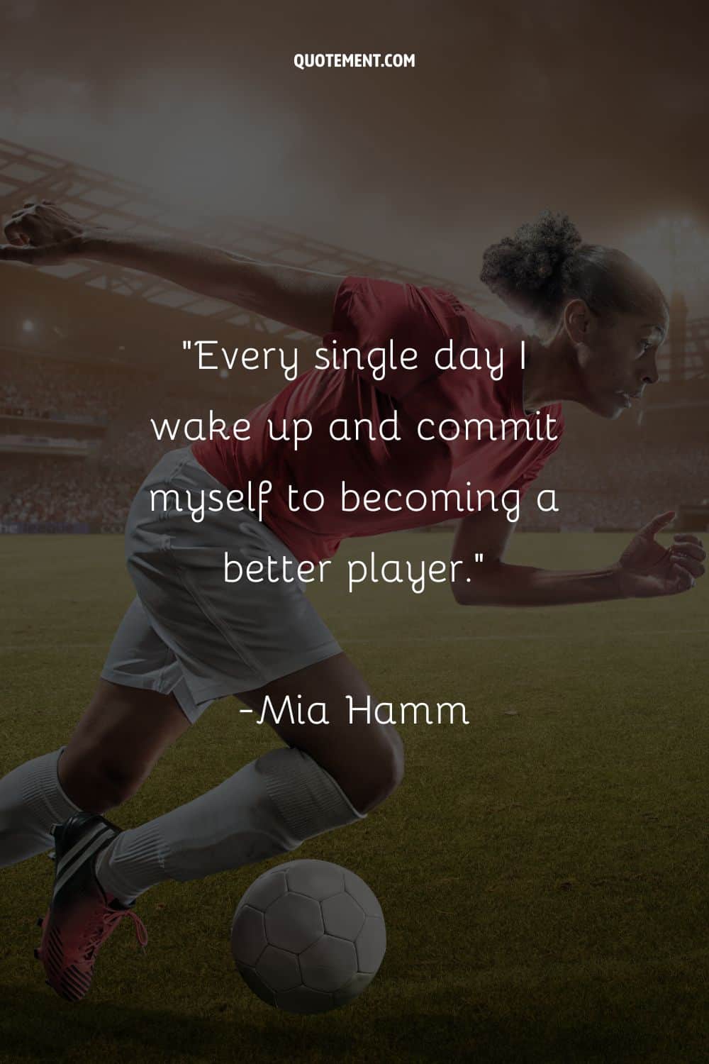 Radiant female footballer seizing the game representing motivational quote soccer