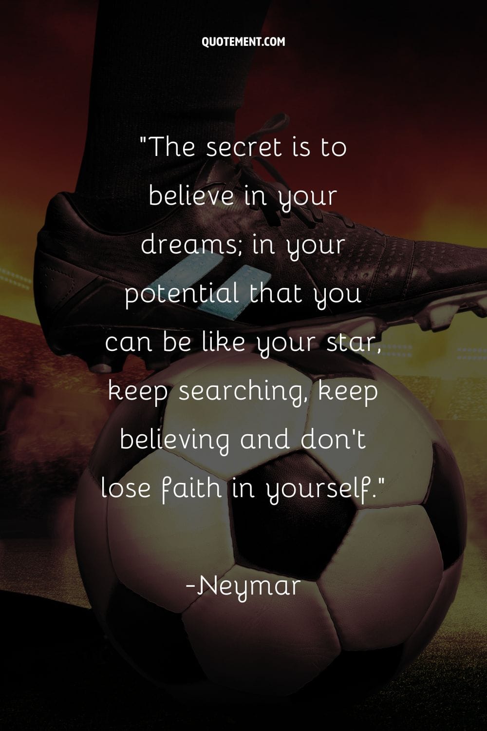 Striker's black cleats on the ball representing inspirational soccer quote