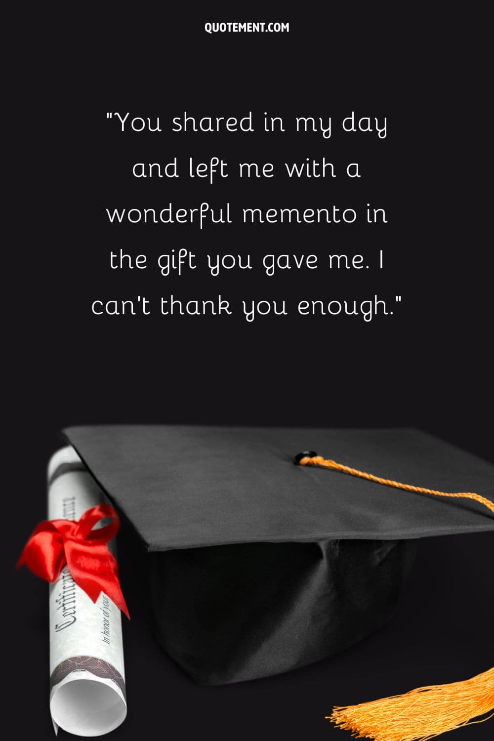 academic cap and a diploma wrapped in satin red ribbon