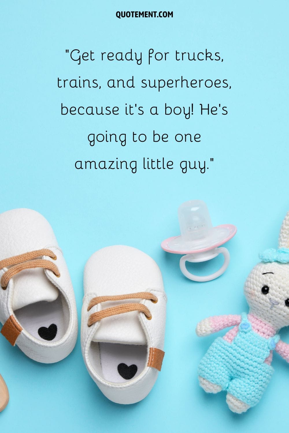 baby shoes, a pacifier, and a toy