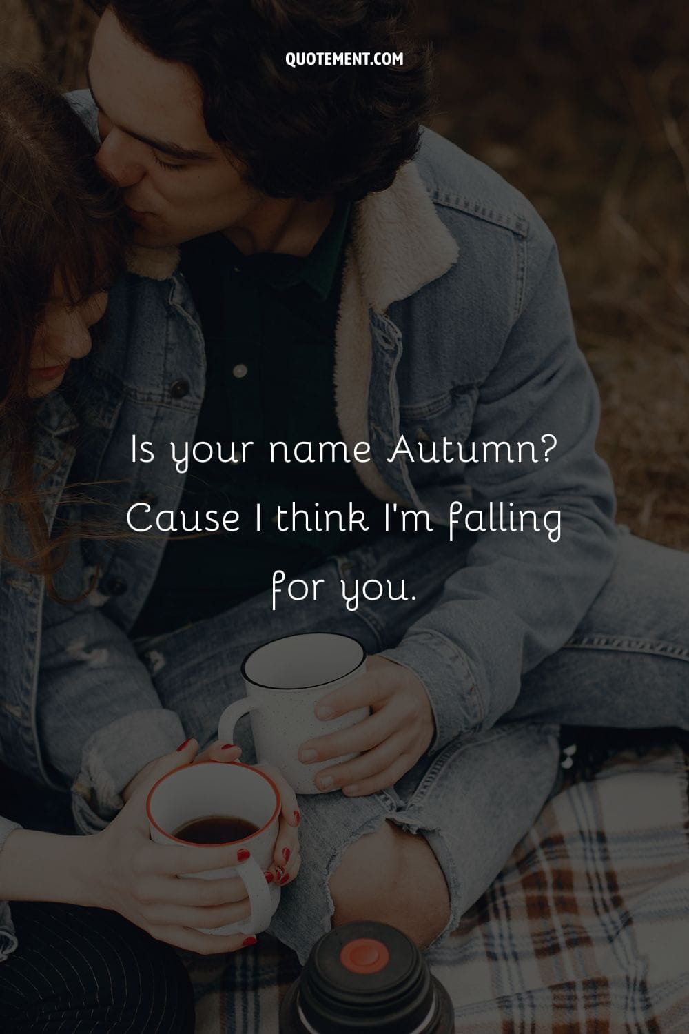 guy kissing girl's forehead amid an autumn coffee date
