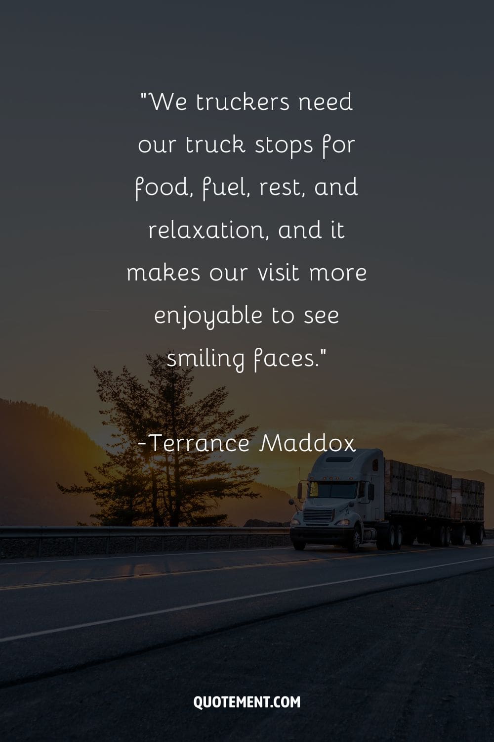 truck on a scenic road next to hills at dusk