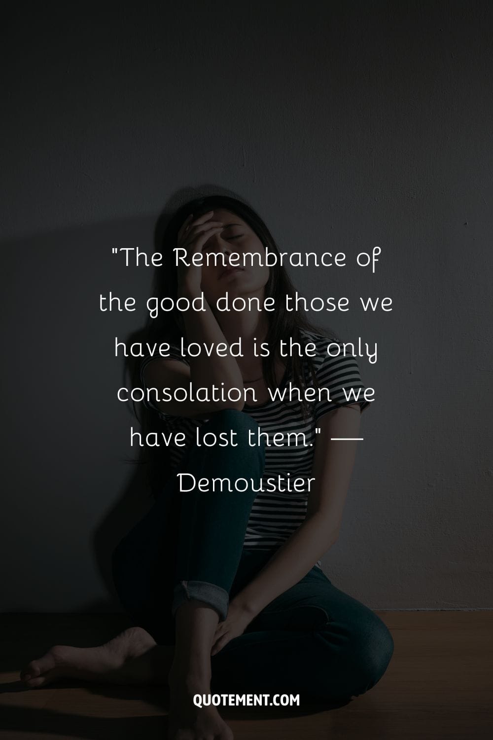 young woman seated on the floor in a state of sadness representing a beautiful condolence quote