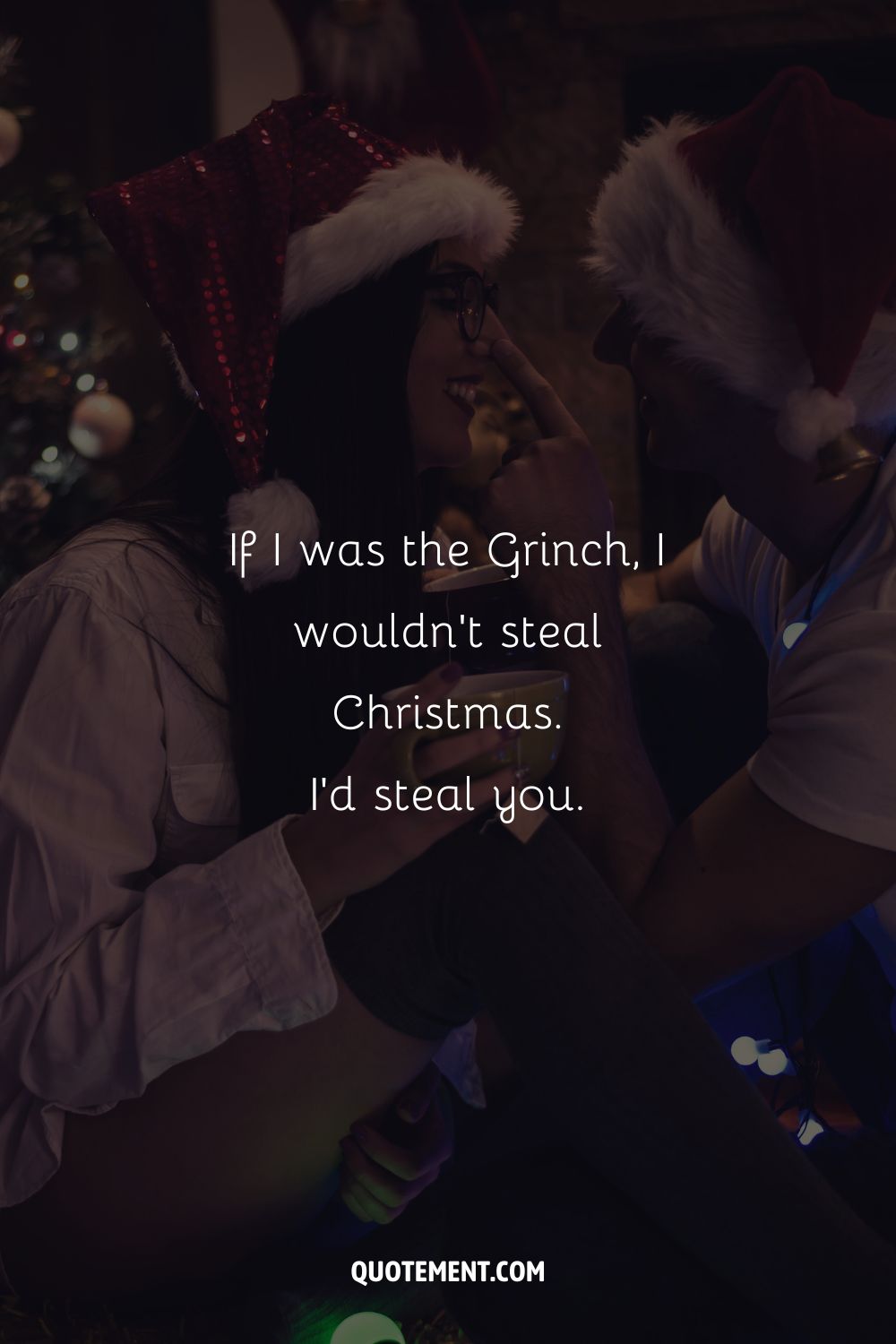 A playful couple in Santa's hats representing an irresistible Christmas pick up line