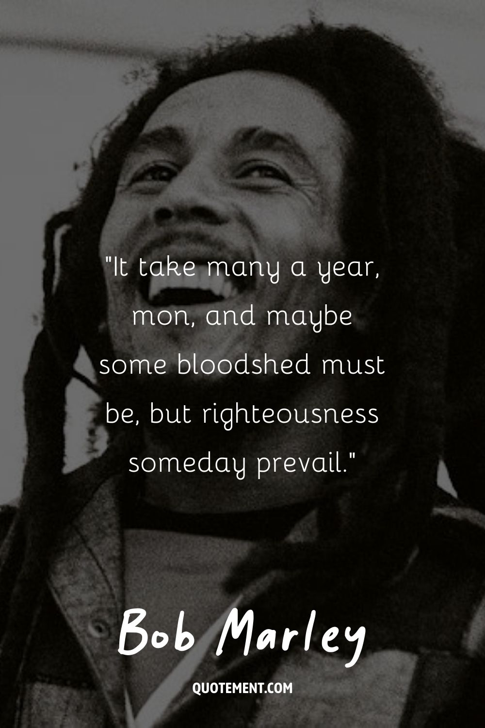 Bob Marley smiling in plaid shirt
