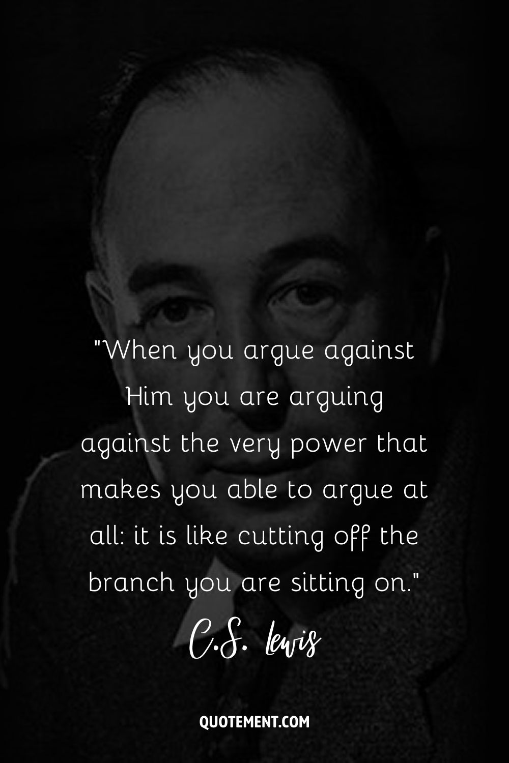 C.S. Lewis poses in grayscale, adorned in a coat and tie
