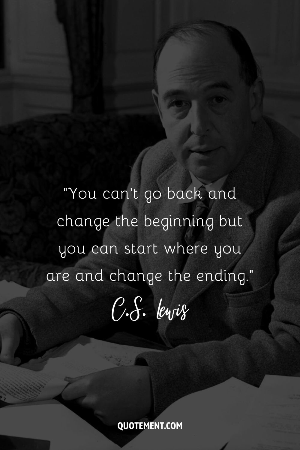 C.S. Lewis with a script in his hands representing the best C.S. Lewis quote