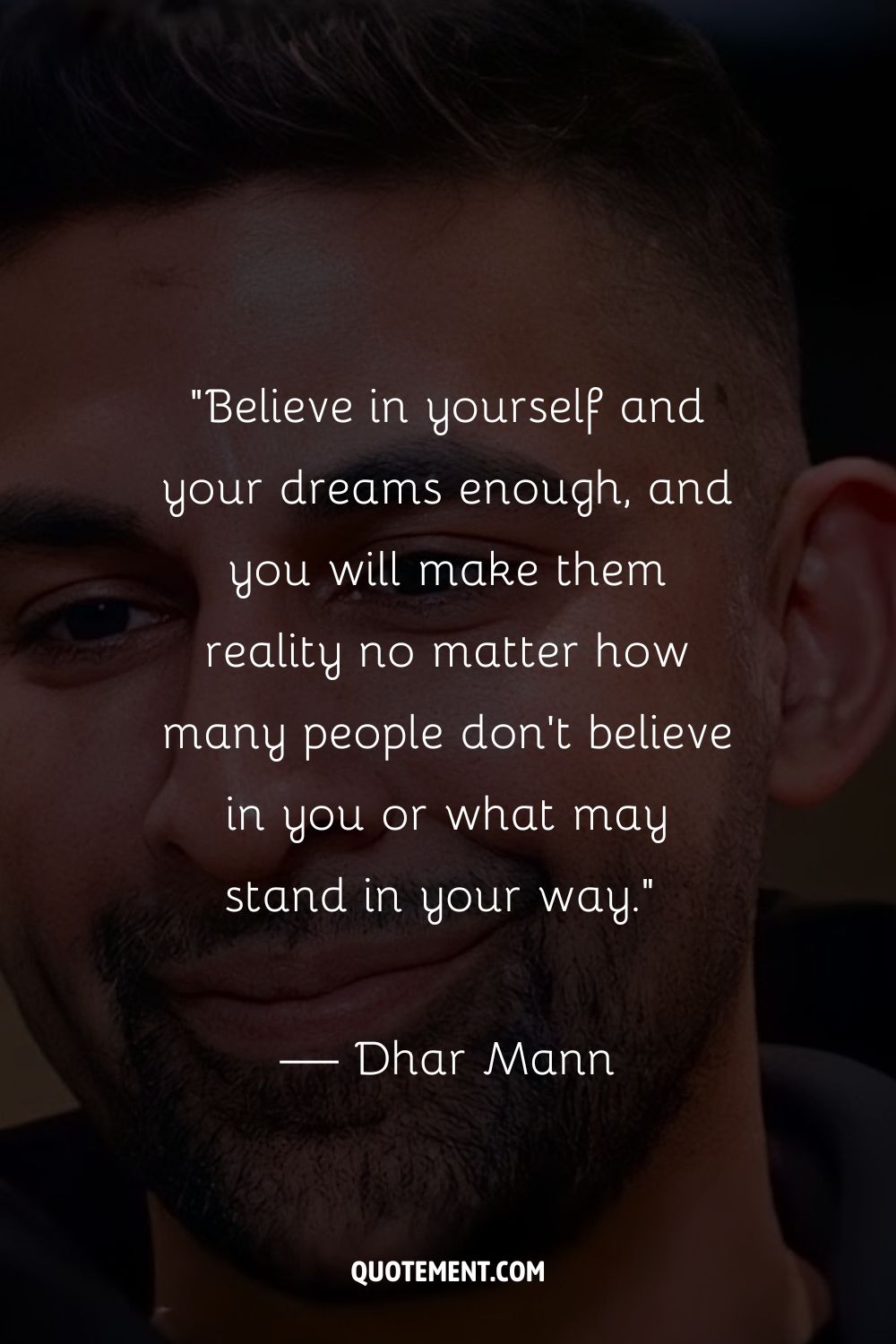Close-up of smiling Dhar Mann representing the top Dhar Mann quote
