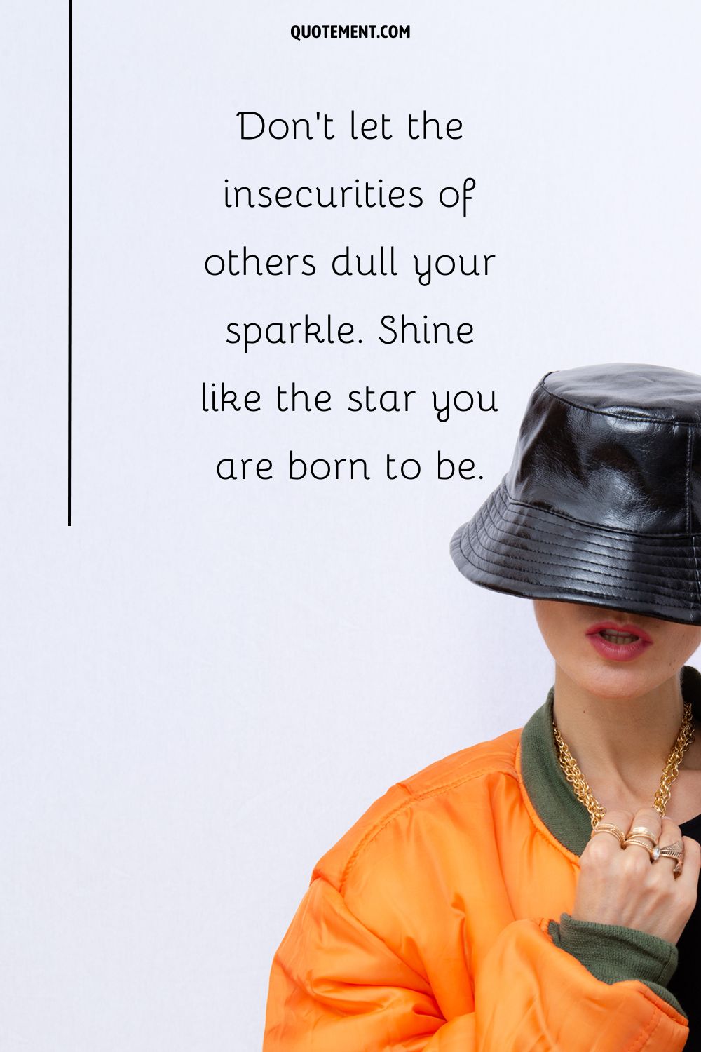 a girl wearing an orange jacket and a black hat representing top attitude captio