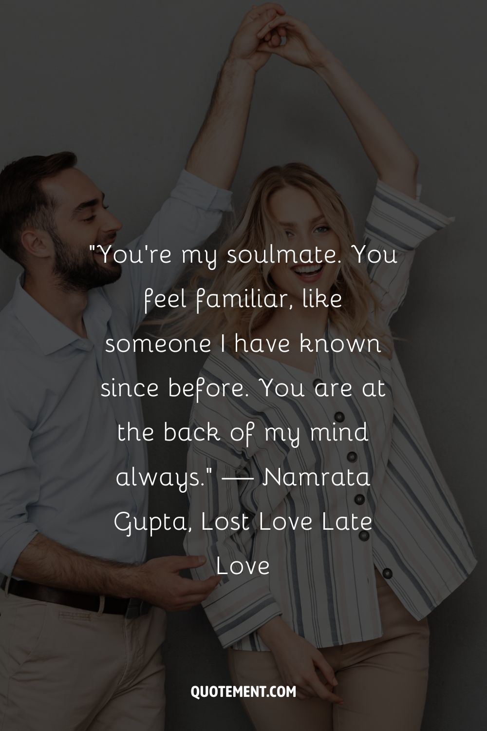 a smiling couple in a dancing pose representing you are my soulmate quote