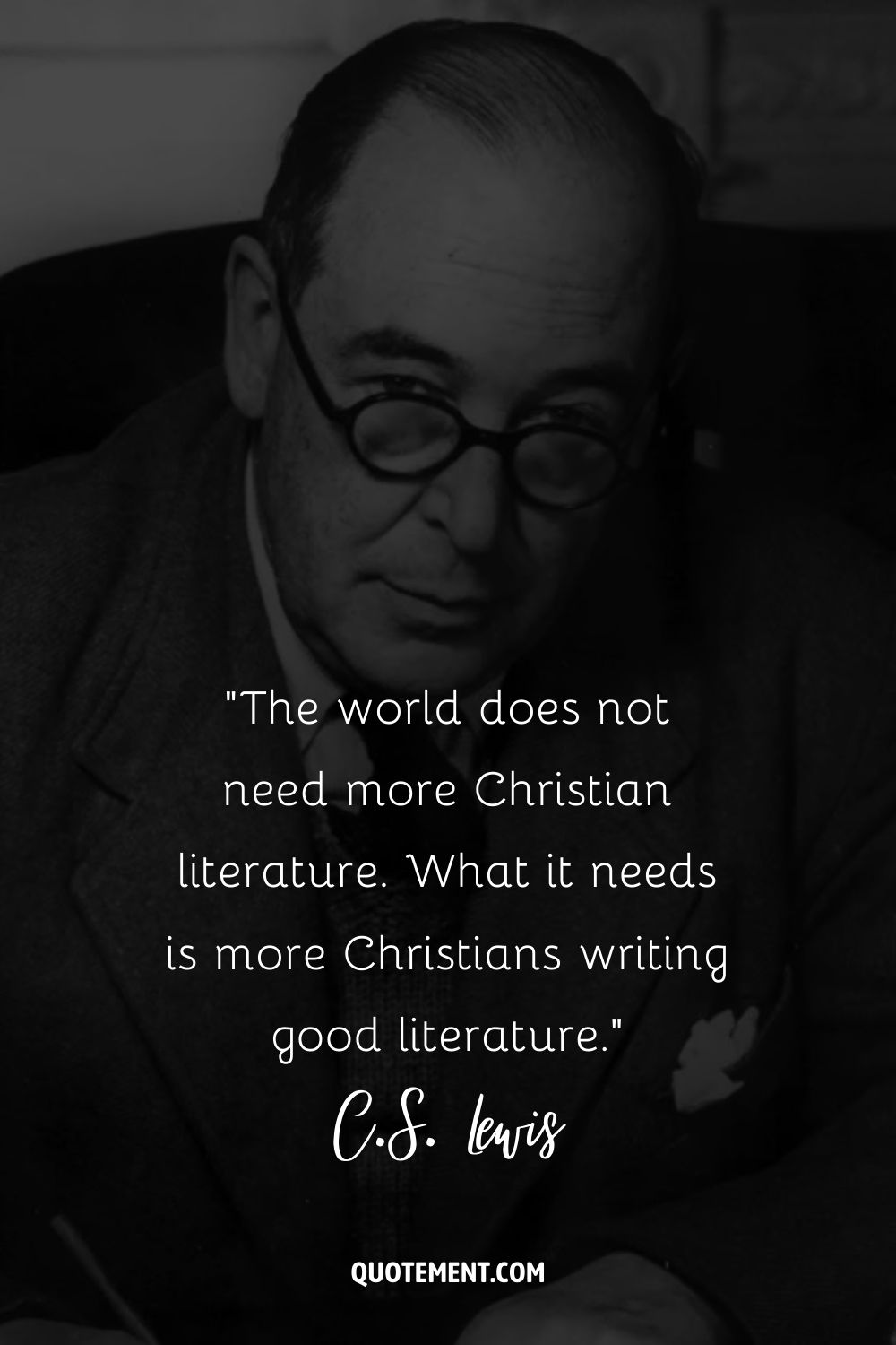 seated with serene focus, C.S. Lewis holds a pen and wears glasses