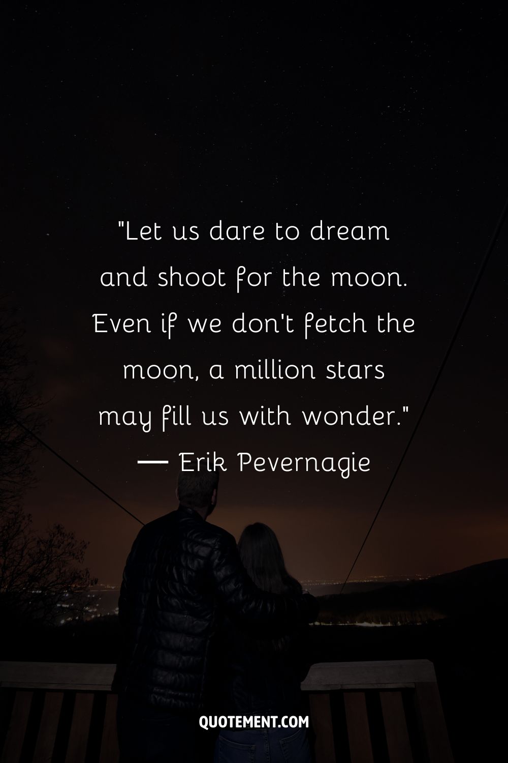 A couple looking at the night sky filled with stars representing an inspiring shoot for the stars quote
