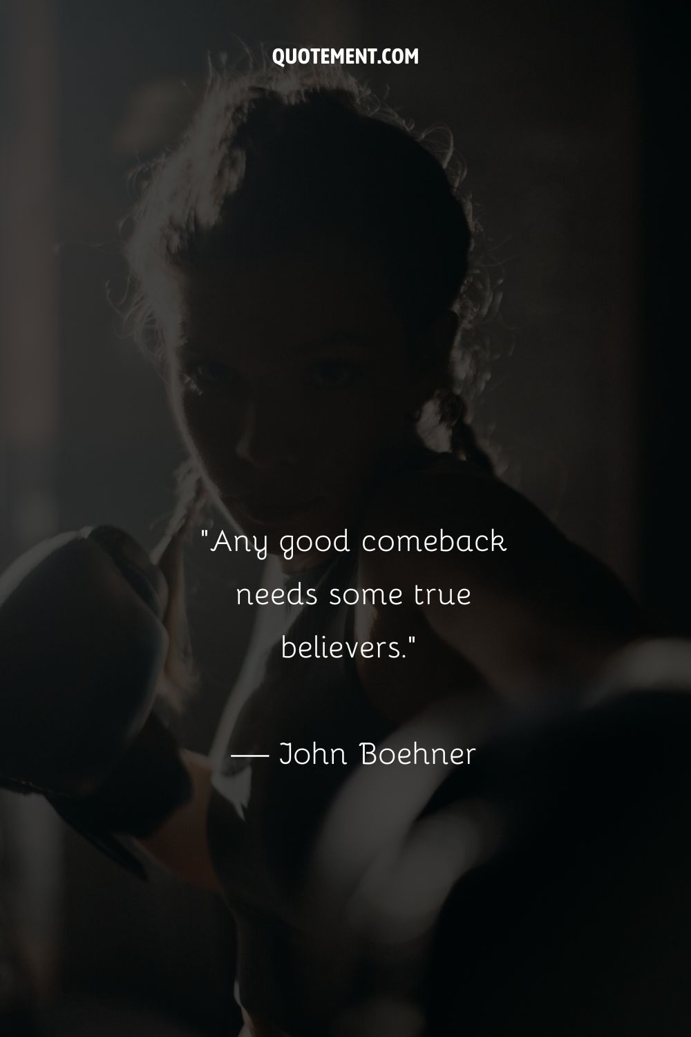 A female boxer's profile captured in silhouette with focused intent
