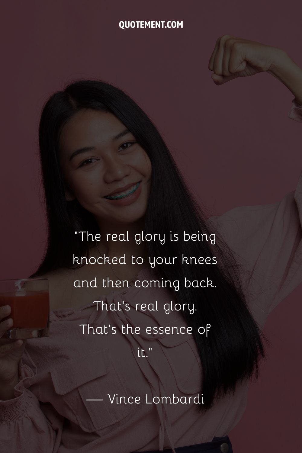 A smiling woman holding a glass of orange drink representing the best comeback quote
