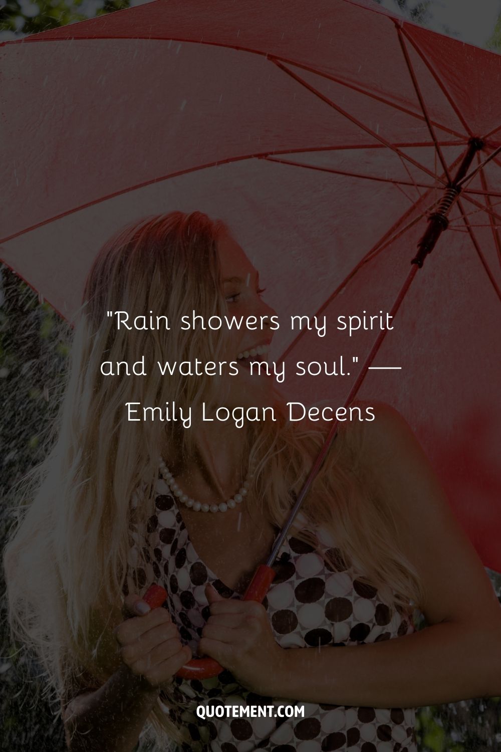 A woman with a red umbrella on a rainy day
