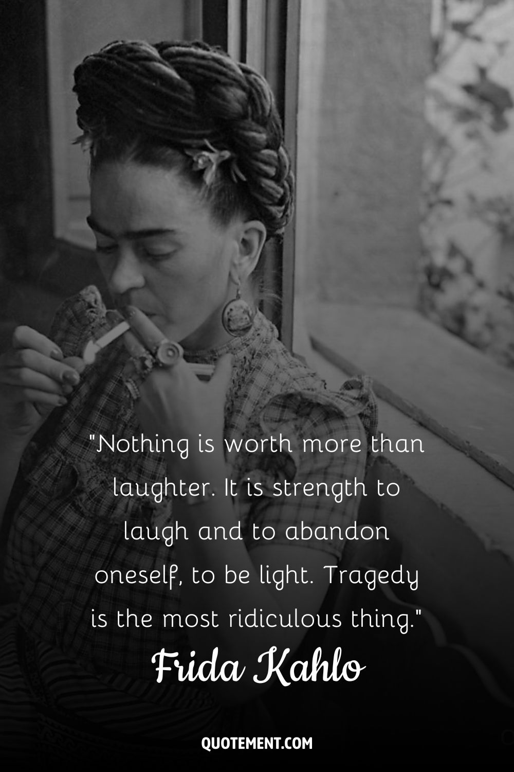 Frida Kahlo lighting up a cigarette
