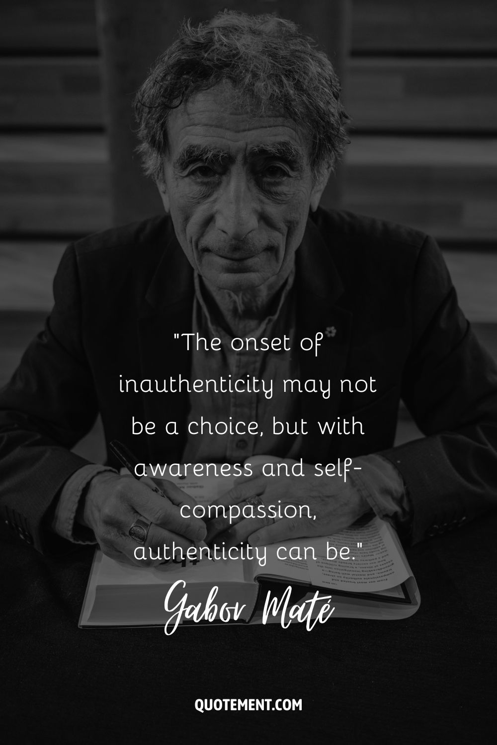 Gabor Mate writing on a book representing a wise Gabor Mate quote
